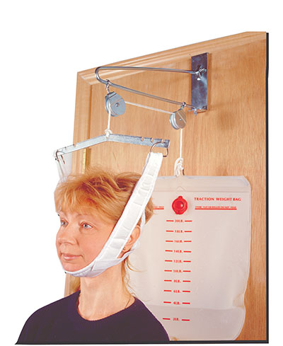 Traction cervical Fabtrac fixé sur porte avec harnais en tissu (velcro)